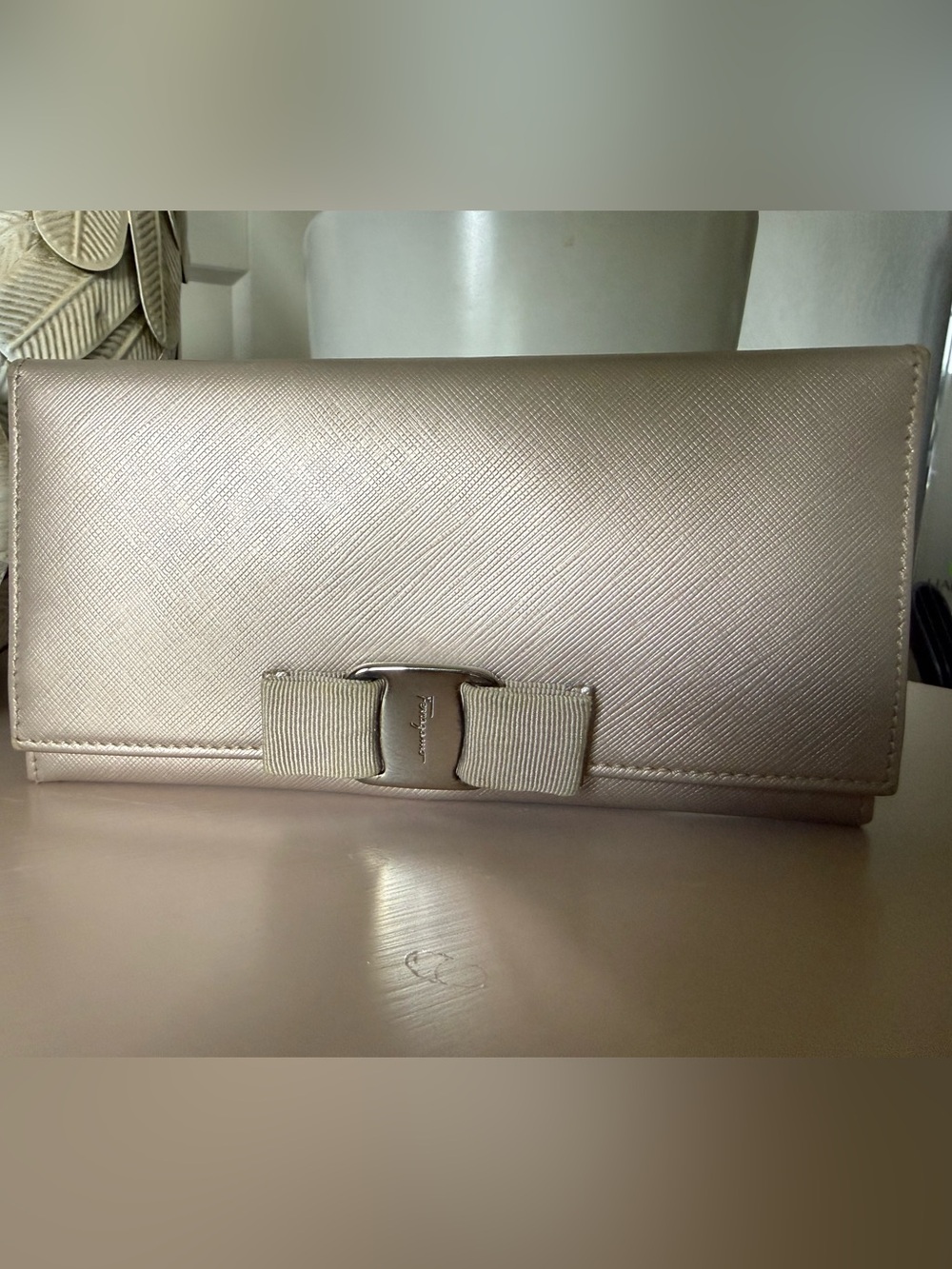 Salvatore Ferragamo Metallic Blush Leather Vara Bow Clutch
